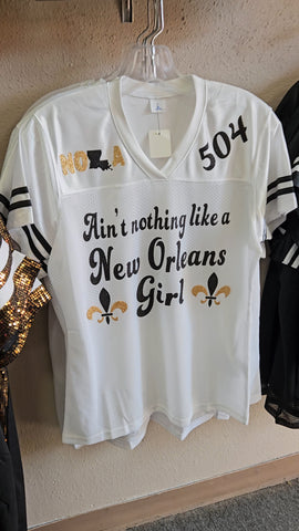 White Ain't nothing like a Nola Girl sparkly jersey (order a size up)*put in notes if you want it to say a different city*