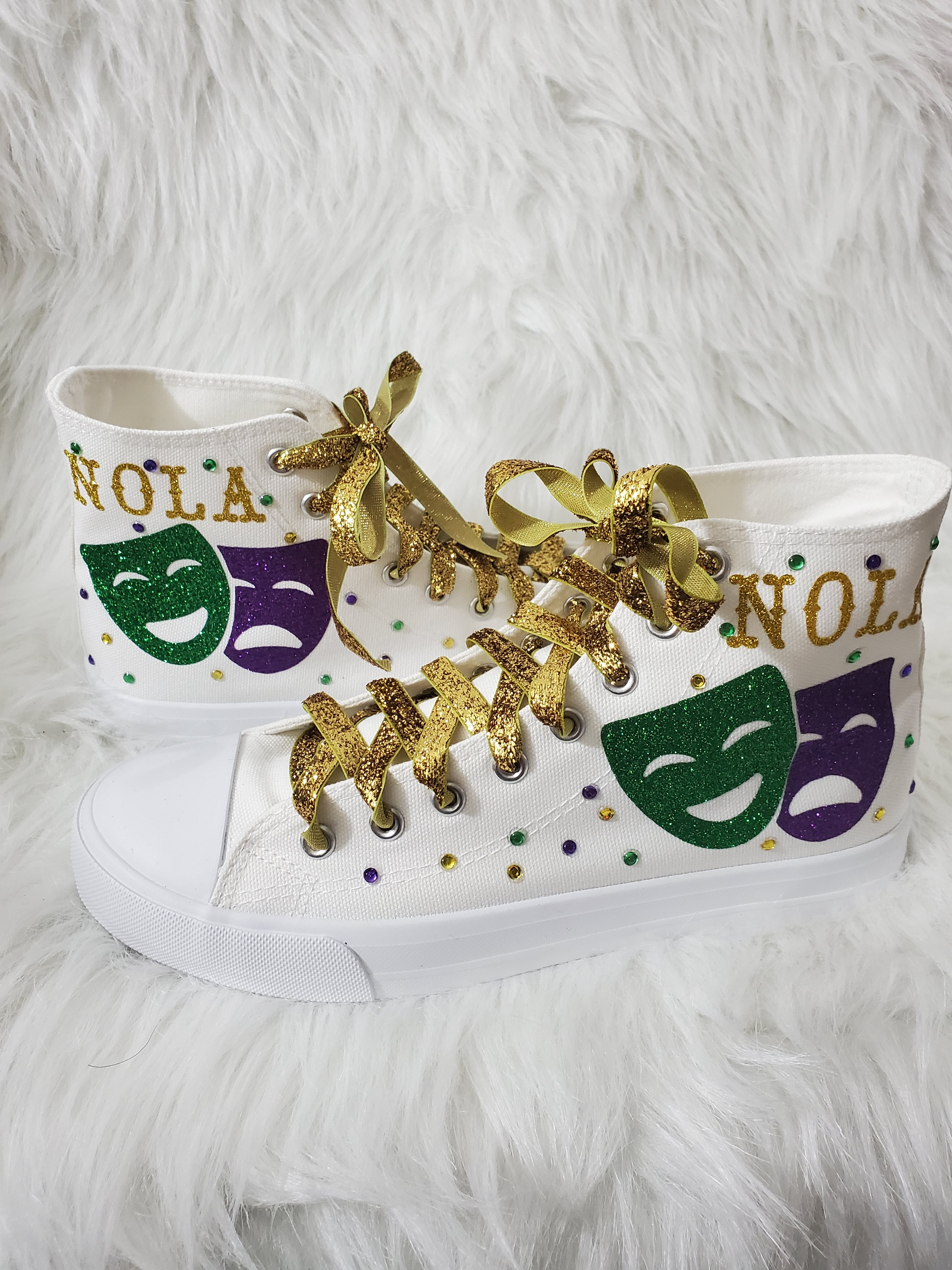 Online option no longer  available (may be available in store)Mardi Gras shoes white (ladies sizes)